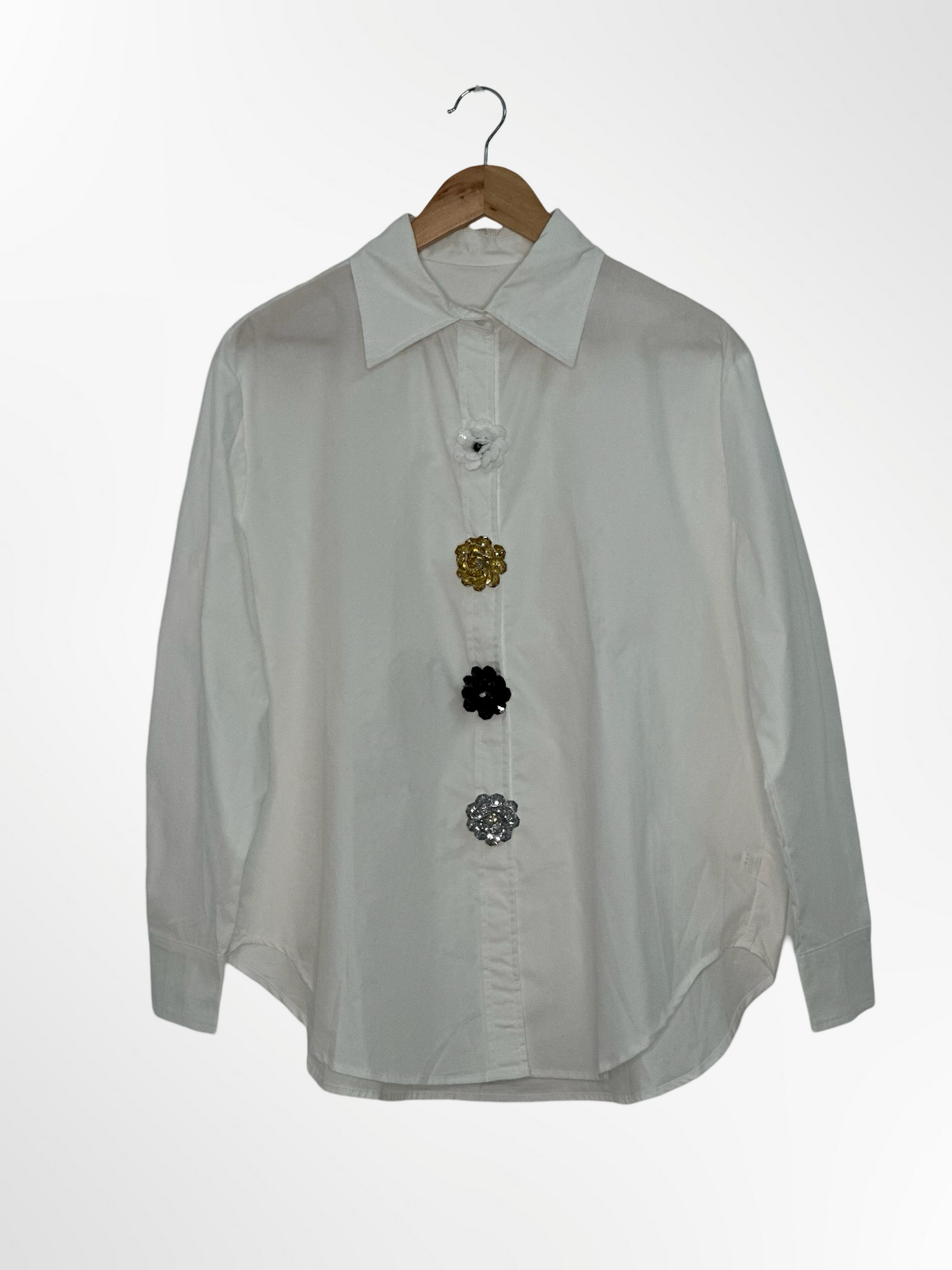 CAMISA BOTÓN FLORES CRUDA