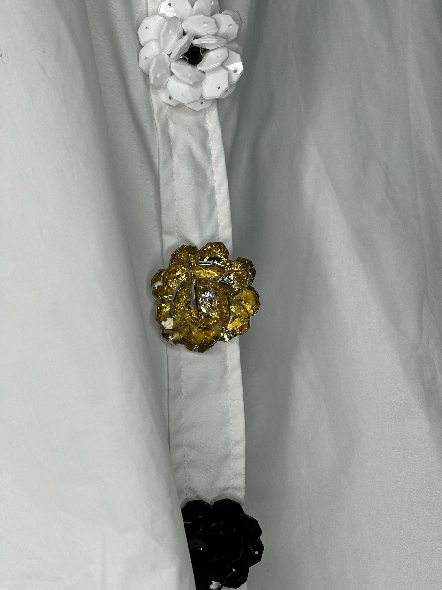 CAMISA BOTÓN FLORES CRUDA
